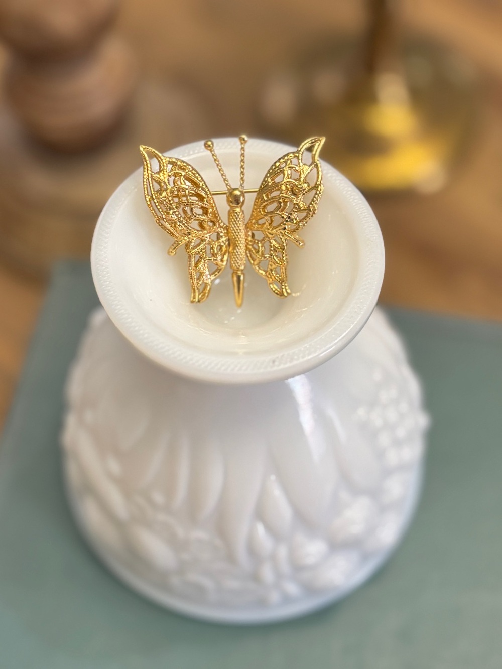 Vintage Monet gold-tone filigree butterfly brooch